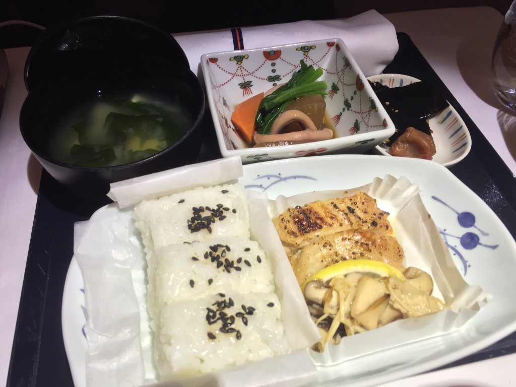 Pre-landing meal â€“ grilled chicken with rice and miso soup