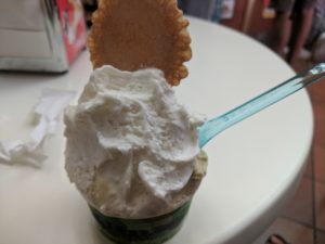 a cup of ice cream with a spoon