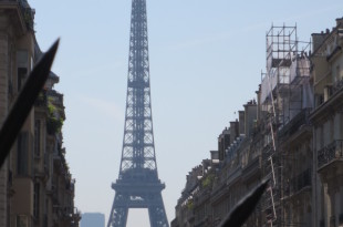 a tall metal tower in the distance