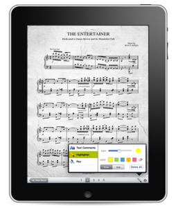 a tablet with a music book