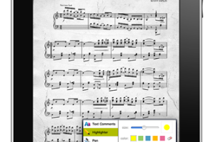 a tablet with a music book