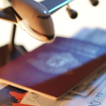 a model airplane and passport
