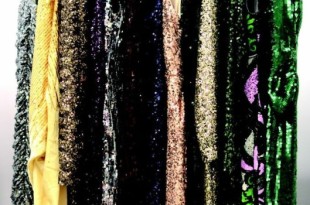 a group of sequins on a rack