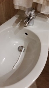 a toothbrush in a toilet