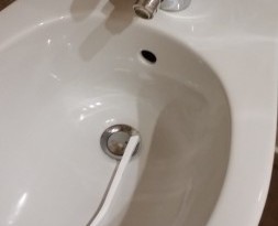 a toothbrush in a toilet