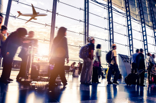 a group of people in an airport