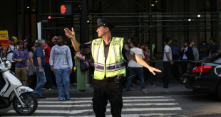 a police officer standing in a street