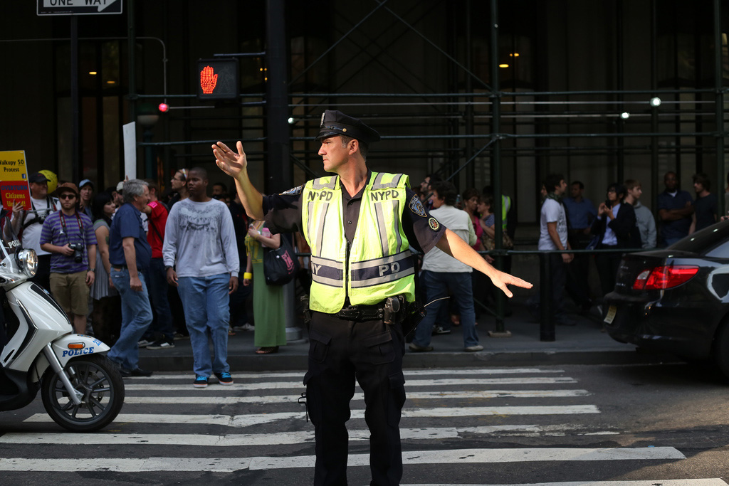 a police officer standing in a street