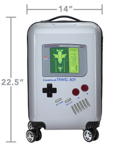 a suitcase with a screen and a game controller