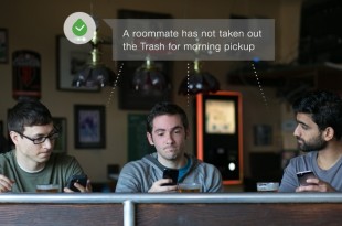 a group of men sitting at a bar