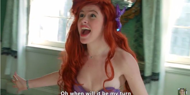a woman with red hair and purple bow in front of a mirror