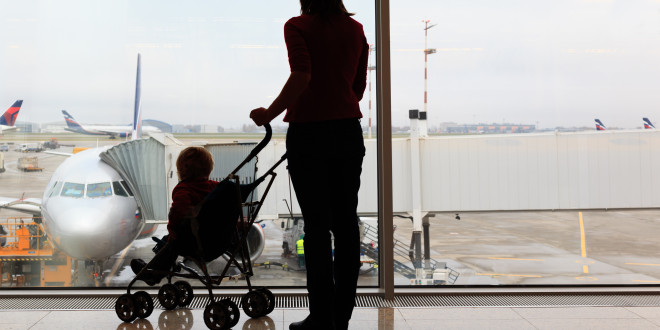 a woman with a baby in a stroller