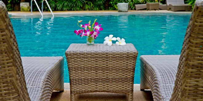 a table next to a pool