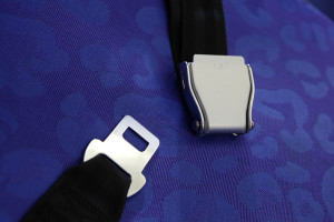 a seat belt on a blue surface