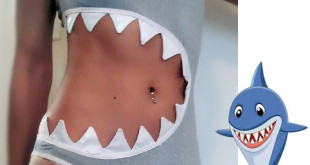 a woman wearing a shark garment