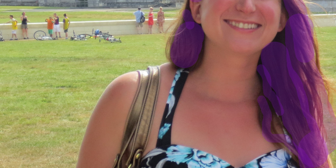a woman smiling at camera