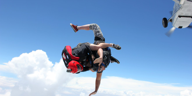 a person skydiving in the air