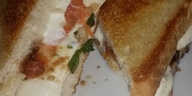 a grilled sandwich on a plate