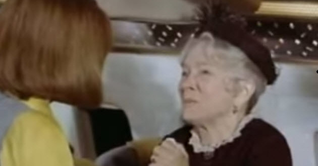 a woman talking to another woman