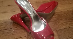 a pair of red high heeled shoes