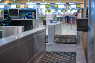 a metal barriers in an airport