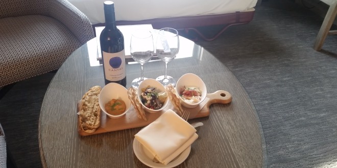 a table with food and wine
