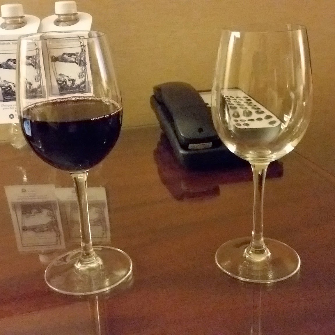 two wine glasses on a table