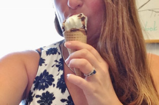 a woman eating an ice cream cone