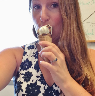 a woman eating an ice cream cone
