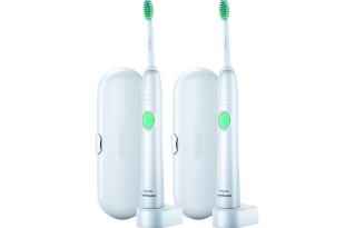 a group of toothbrushes with a case