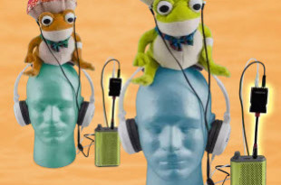a group of stuffed animals on top of a headphone