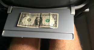a dollar bill on a tray
