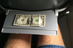 a dollar bill on a tray