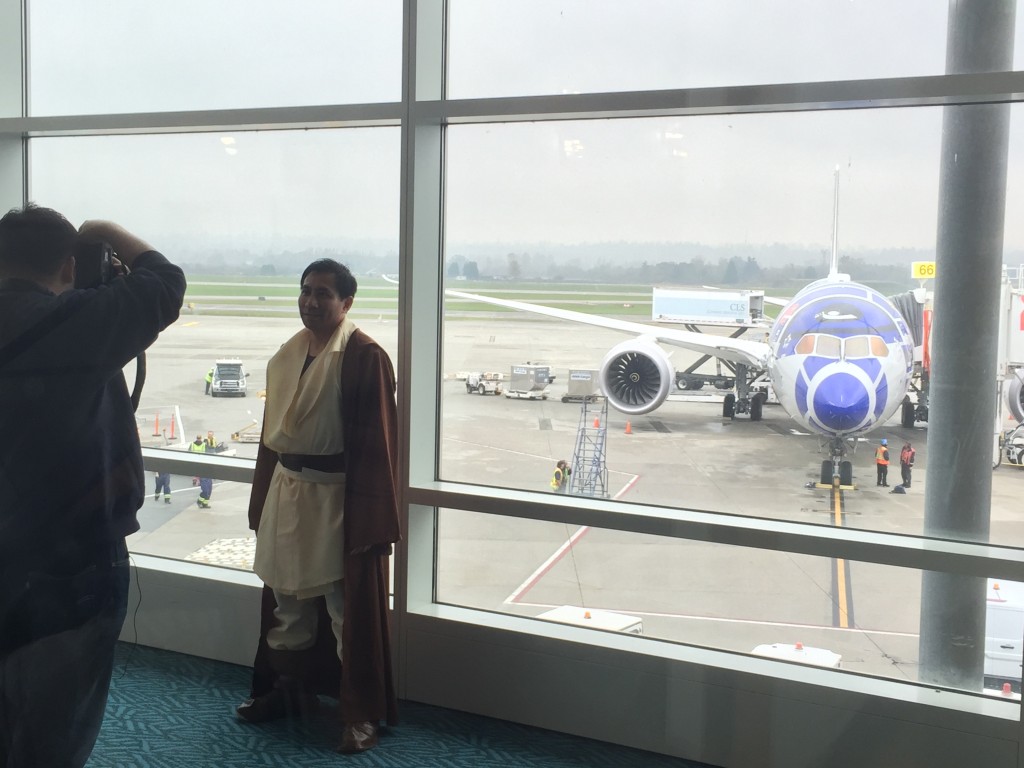 A passenger coming off of the inbound flight was dressed as a Jedi!