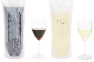 a group of wine bottles and a glass of wine