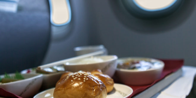 food on a tray on a plane