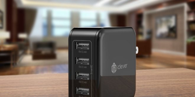 a black usb charger on a wood surface
