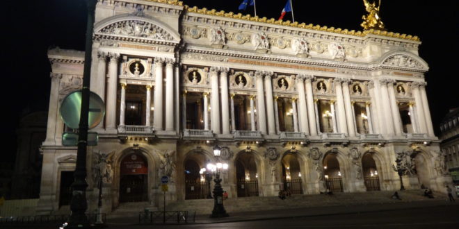 Palais Garnier with statues on top of it