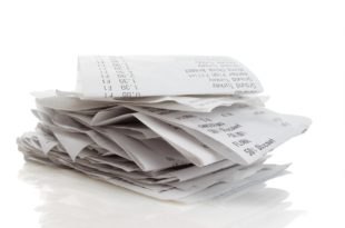 a stack of receipt papers