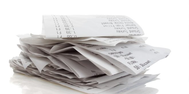 a stack of receipt papers