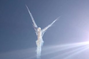 a white angel in the sky