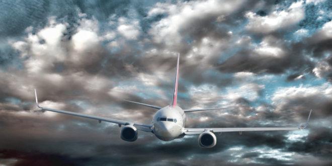 a plane flying in the sky