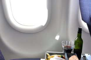 food on a tray in an airplane