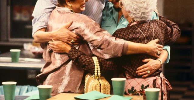 a group of women hugging