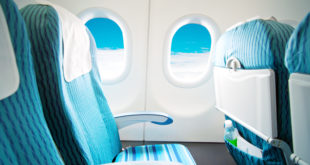 a blue and white airplane seats