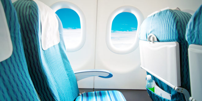 a blue and white airplane seats