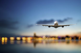 an airplane flying over water