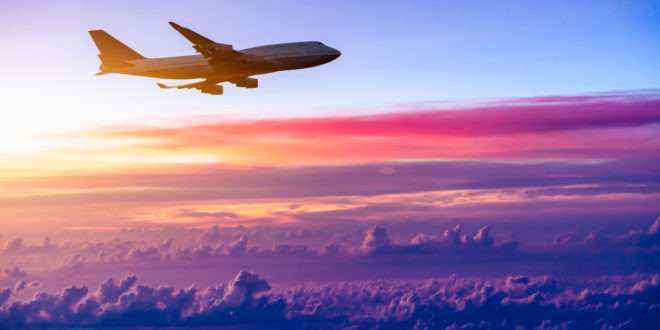 a plane flying in the sky