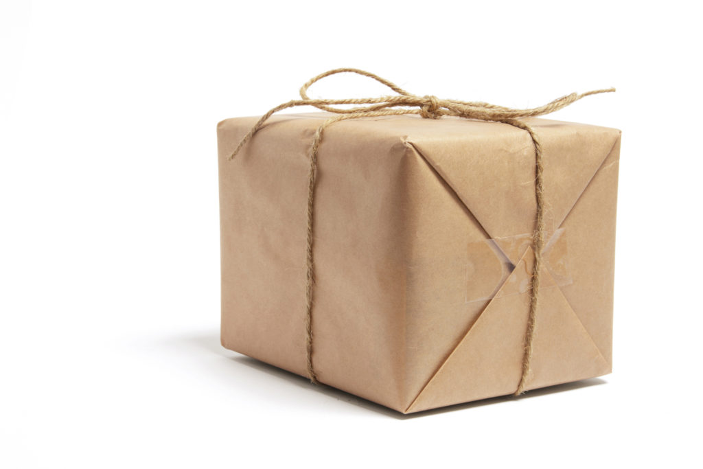 brown paper packages tied up in strong