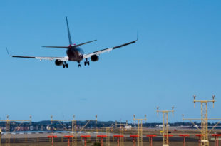 an airplane flying in the sky